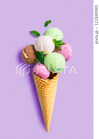 Ice cream scoops in waffle cone Ice cream scoops in waffle cone 122880985