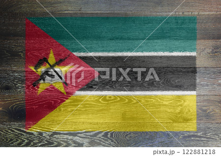Mozambique flag on rustic old wood Mozambique flag on rustic old wood 122881218