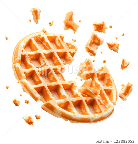 A golden waffle with a bitten piece and crumbs isolated on a transparent background. Crispy and appetizing breakfast food 122882052
