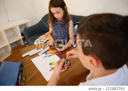 Children engaging in creative activities Children engaging in creative activities 122882762