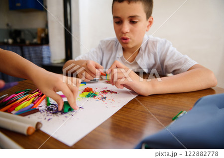Children creating colorful artwork together 122882778