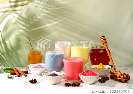 A variety of colorful matcha latte, Japanese tea, golden turmeric, lavender blue and pink moon milk. The trendy healthy drink promotes weight loss, a relaxing drink before bed and has A variety of colorful matcha latte, Japanese tea, golden turmeric, lavender blue and pink moon milk. The trendy healthy drink promotes weight loss, a relaxing drink before bed and has 122883702