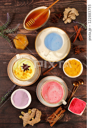 A variety of Japanese tea, matcha latte, golden turmeric, lavender blue and pink moon milk. The trendy healthy drink promotes weight loss, relaxes before bed and has anti-inflammatory properties. A variety of Japanese tea, matcha latte, golden turmeric, lavender blue and pink moon milk. The trendy healthy drink promotes weight loss, relaxes before bed and has anti-inflammatory properties. 122883755