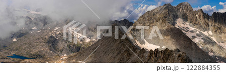 Panoramic View of Rocky Mountain Range with Clouds Panoramic View of Rocky Mountain Range with Clouds 122884355