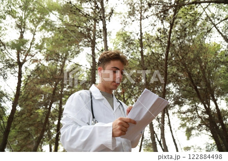 Sad Doctor Prepares for Bad News to Patient in Park Outside Hospital Sad Doctor Prepares for Bad News to Patient in Park Outside Hospital 122884498