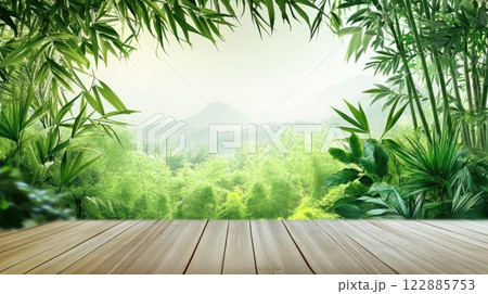 A lush green forest with a wooden platform in the middle 122885753