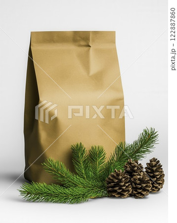 Brown Paper Bag with Pine Cones and Evergreen Leaves Decor 122887860