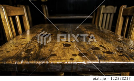 Stained and Sticky Wooden Dining Tables in a Cafeteria Setting Stained and Sticky Wooden Dining Tables in a Cafeteria Setting 122888237
