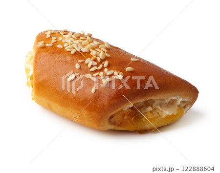 Delicious confectionery pastry with sweet filling and sesame seeds showcased on a clean background 122888604