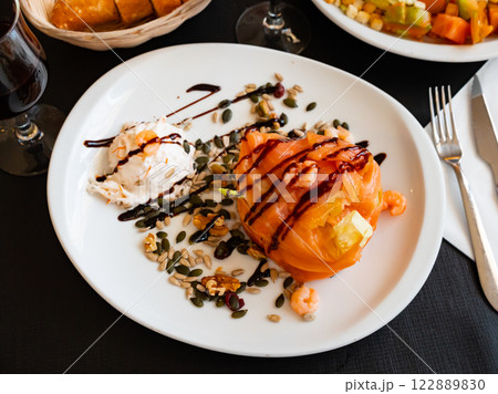 Salad with salmon, shrimps, vegetables and cream cheese Salad with salmon, shrimps, vegetables and cream cheese 122889830