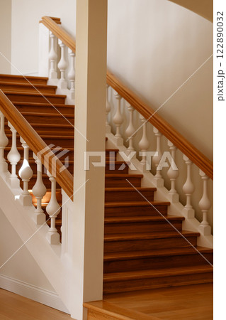 Grand Wooden Staircase in a Historic Mansion Grand Wooden Staircase in a Historic Mansion 122890032