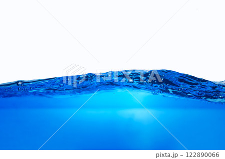 Closeup view of dynamic flowing blue water waves on white background. Liquid splash. Texture and abstract background Closeup view of dynamic flowing blue water waves on white background. Liquid splash. Texture and abstract background 122890066