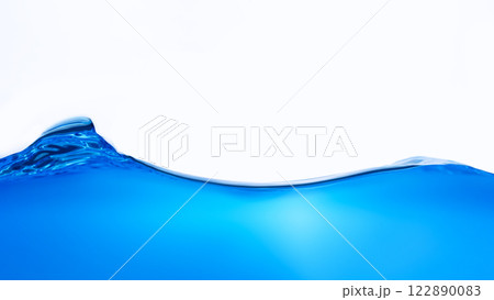 Closeup view of dynamic flowing blue water waves on white background. Liquid splash. Texture and abstract background Closeup view of dynamic flowing blue water waves on white background. Liquid splash. Texture and abstract background 122890083