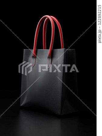 3D rendering of a shopping paper bag with red handle, floating against black background, high-resolution for Black Friday 122892215