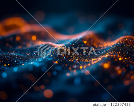 Waves of light create a mesmerizing pattern in blue and orange tones at night 122897438