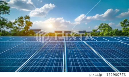Group of solar panels are installed in green field 122900778