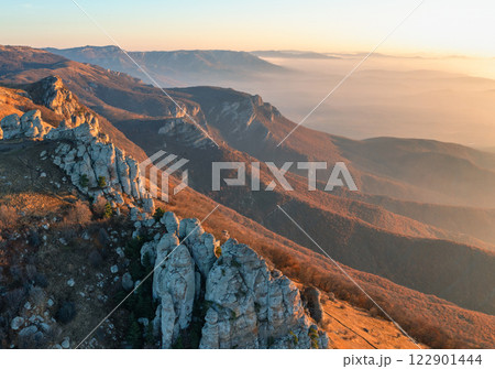 View of the peaks of Mount Demerdzhi in Crimea at sunrise View of the peaks of Mount Demerdzhi in Crimea at sunrise 122901444