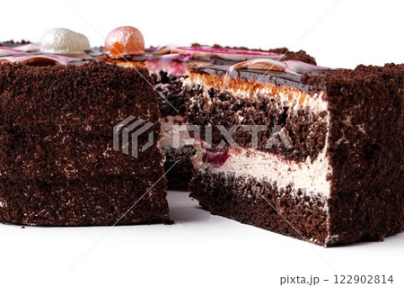 Delicious dessert featuring layers of creamy filling and crunchy topping with a nut coating Delicious dessert featuring layers of creamy filling and crunchy topping with a nut coating 122902814