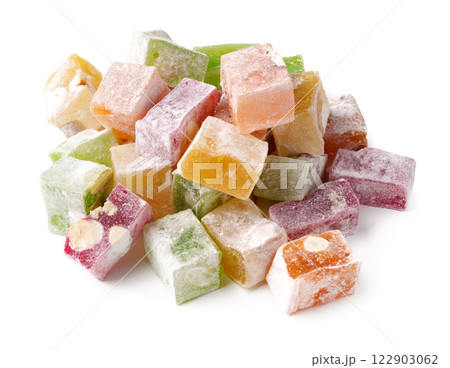 Delicious mix of colorful gummy candies arranged in a casual pile on a white background 122903062