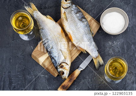 Beer and dried fish 122903135