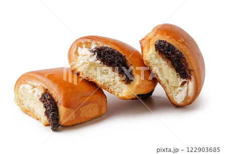 Baked pastries with cream and chocolate filling displayed on a white background 122903685