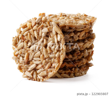 Crunchy oat snacks stacked neatly for a healthy treat option rich in flavor and texture 122903807
