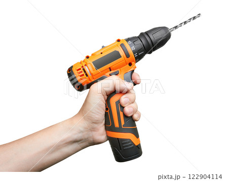 Battery screwdriver or drill in hand 122904114