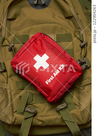 First Aid Kit on army backpack First Aid Kit on army backpack 122904263