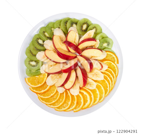 Sliced fruit in a platter on white Sliced fruit in a platter on white 122904291
