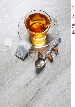 Cup of Tea on a light wooden background Cup of Tea on a light wooden background 122904345