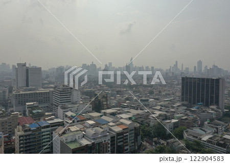 It is DUST in the Air in 2019, the Air Pollution of PM2.5 of the suburbs stretching to the big city. which was shrouded in dirty dust and the sky was wide with gigantic clouds. 122904583