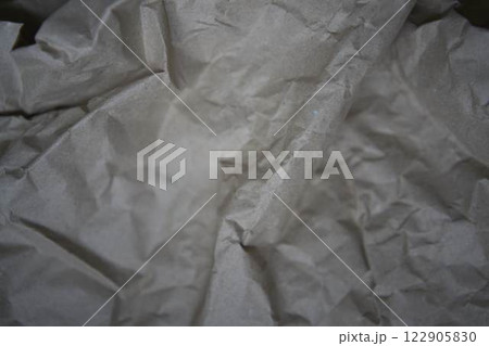 a crumpled brown wrapping paper, texture, background 122905830