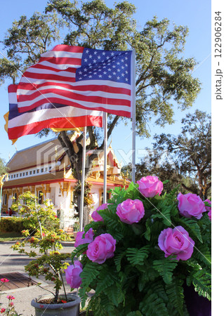 American Flag With Thai Flag at Buddhist Temple in Tampa Florida 122906284