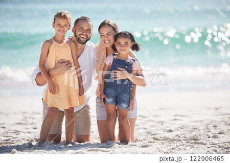 Family beach, children travel and parents on holiday with kids in the Maldives during summer together. Portrait of young girl siblings happy on sea vacation by the ocean with mother and father Family beach, children travel and parents on holiday with kids in the Maldives during summer together. Portrait of young girl siblings happy on sea vacation by the ocean with mother and father 122906465
