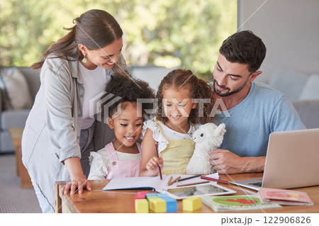 Family, children and education with a mother and father teaching their girl kids in the living room while doing homework. Study, learning and book with parents helping their daughter at home 122906826