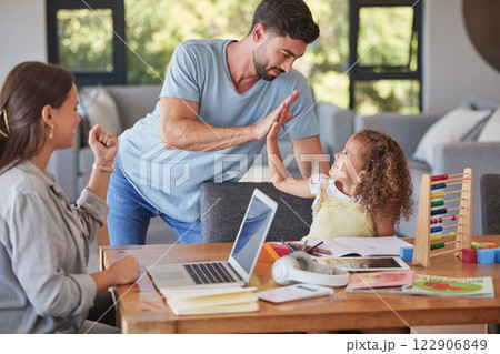 High five, family and education with a student girl learning and studying at home while her parents remote work from home. Study, school and support with a father giving motivation to his daughter 122906849