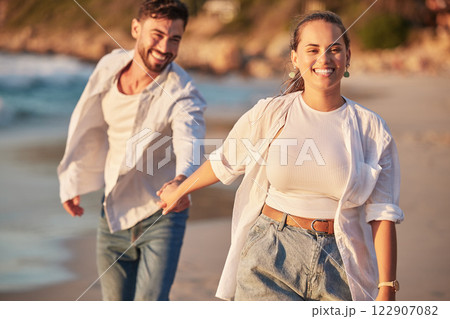 Happy couple, beach and travel while holding hands, laughing and having fun on Portugal summer vacation or holiday traveling to seaside. Smile of man and woman on honeymoon sharing love and adventure Happy couple, beach and travel while holding hands, laughing and having fun on Portugal summer vacation or holiday traveling to seaside. Smile of man and woman on honeymoon sharing love and adventure 122907082