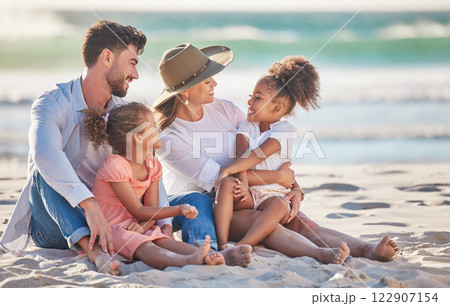 Interracial family, beach vacation and travel with children and parents sitting in sand enjoying summer holiday in maldives. Man, woman and girl kids having fun and feeling happy on a tropical trip Interracial family, beach vacation and travel with children and parents sitting in sand enjoying summer holiday in maldives. Man, woman and girl kids having fun and feeling happy on a tropical trip 122907154