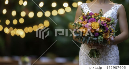 Bride Walking Down the Aisle with Beautiful Lace and Flower Bouquet 122907406