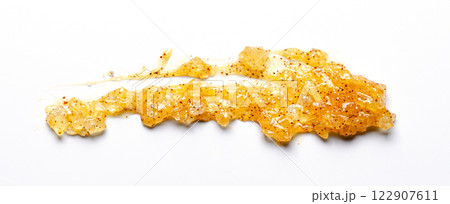 A sample of a cosmetic body care scrub. White background. A sample of a cosmetic body care scrub. White background. 122907611