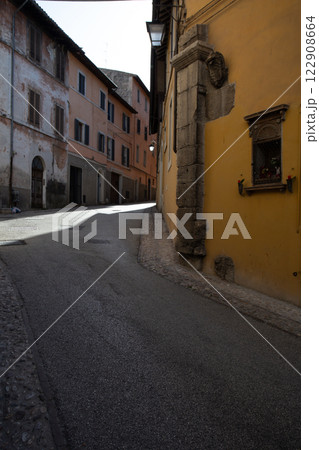The winding narrow streets, stairs and charming architecture of Spoleto 122908664