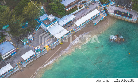 Feb 9 2025 Aerial View of Coastal Area with Vibrant Blue Sea Feb 9 2025 Aerial View of Coastal Area with Vibrant Blue Sea 122910239