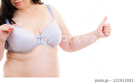 Big woman in bra, body positive. 122912881
