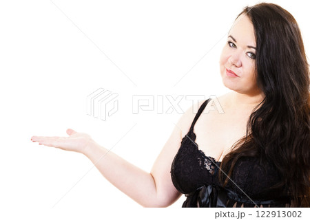 Woman plus size in lingerie holds open hand 122913002