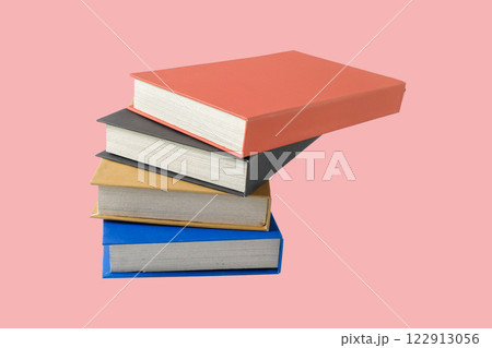 Stack of many hardcover books isolated on white background. 122913056