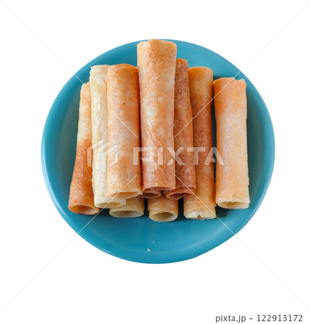 Crispy Thong Muan or Crispy coconut roll dessert is a kind of Thai sweetmeat. Crispy Thong Muan or Crispy coconut roll dessert is a kind of Thai sweetmeat. 122913172