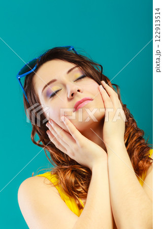 Girl closed eyes daydreaming portrait 122913514