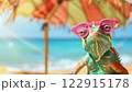 A Colorful Chameleon Wearing Glasses Relaxes on a Beach Under Pink Umbrellas. Generative AI 122915178