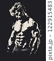 Man with a muscular body is standing in front of a black background 122915483