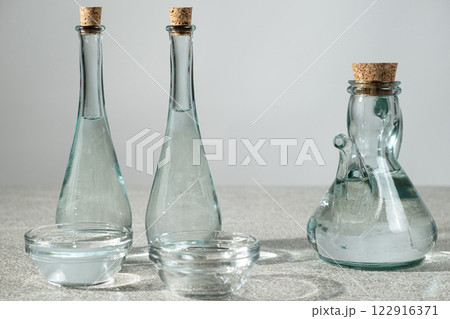 White distilled table vinegar in a glass bowls White distilled table vinegar in a glass bowls 122916371